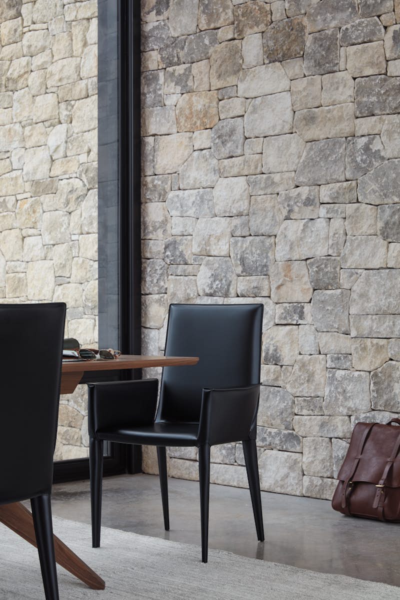 Bottega Armchair at a dining table