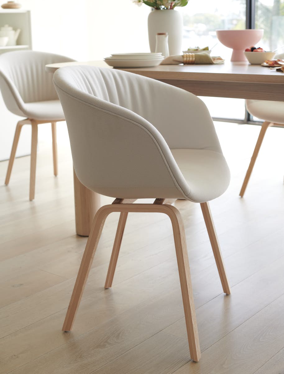 HAY About A Chair 23 Armchair at a dining table